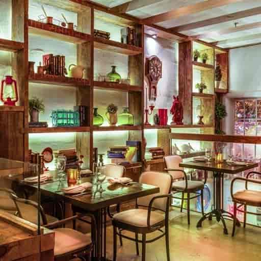 Stylish Ambar Restaurant setting with warm lighting for intimate gatherings and corporate events.