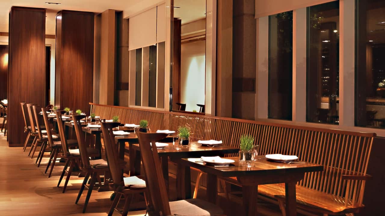 "Blue Duck Tavern dining space with warm wood tones for events and gatherings."