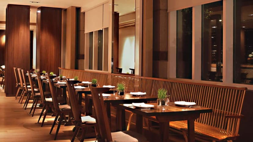 "Blue Duck Tavern dining space with warm wood tones for events and gatherings."
