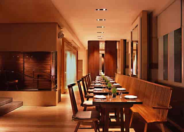 Modern dining space at Blue Duck Tavern, ideal for intimate gatherings and corporate dinners.