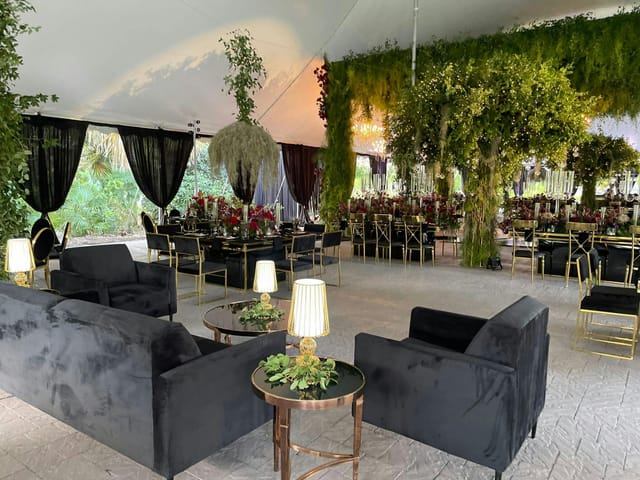Elegant event space in Boqueria with black seating, ideal for weddings and upscale gatherings.