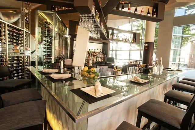 Modern bar setup in Chef’s Table Room, ideal for networking events and social gatherings.