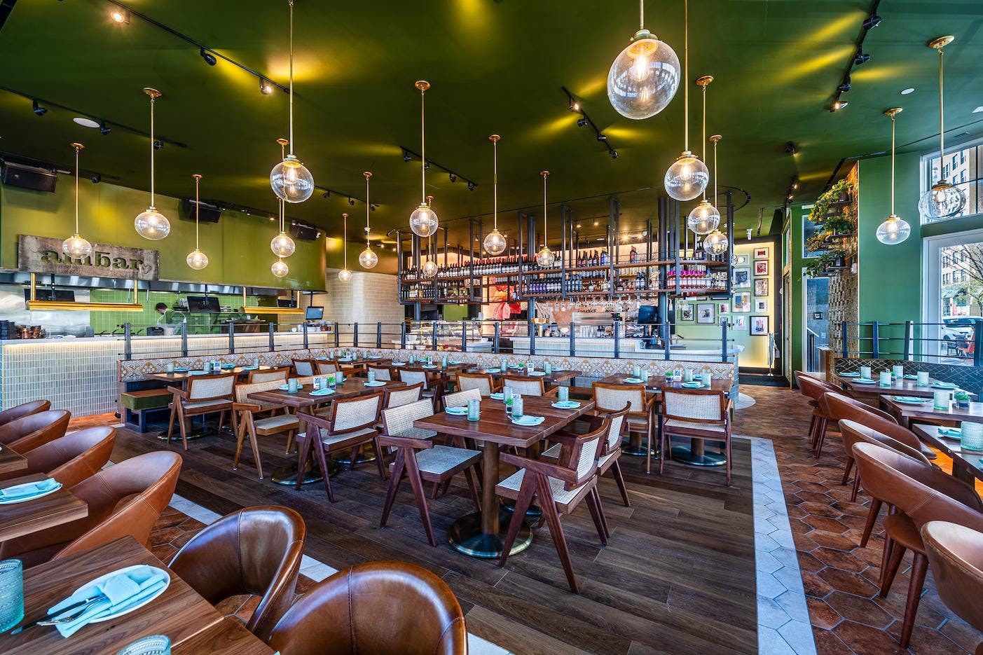 Escondido Room at Oyamel: modern private dining with vibrant green decor for events.