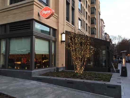 Stylish Sfoglina Pasta House venue with warm lighting, perfect for events and gatherings.