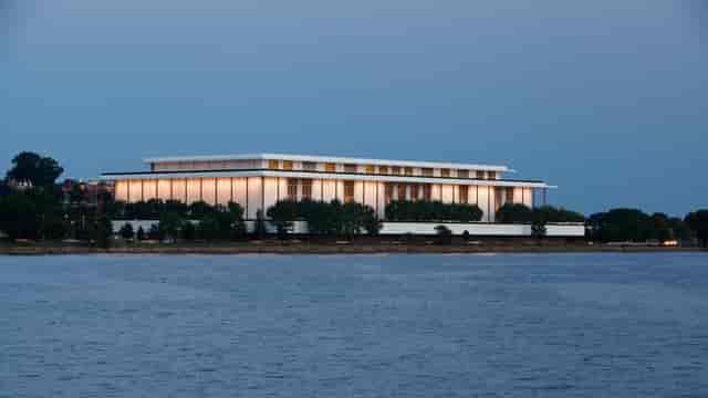 Kennedy Center theater with illuminated facade, ideal for upscale events and gatherings.