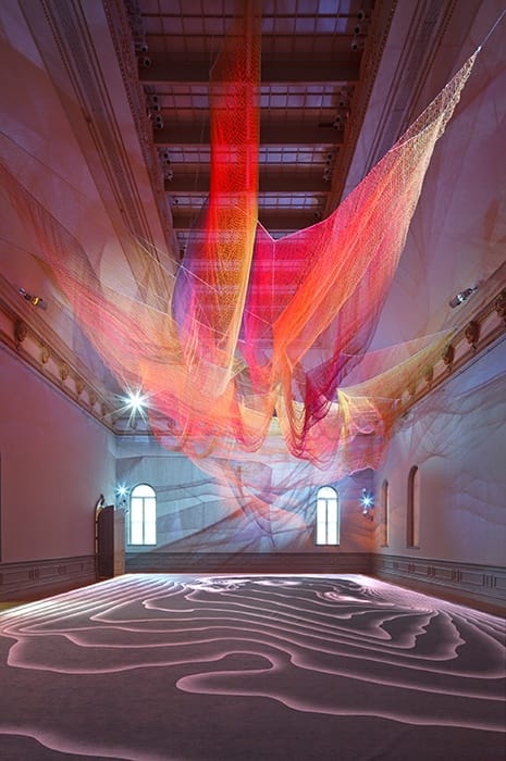 Colorful fabric installation in Grand Salon, Renwick Gallery for creative events and networking.