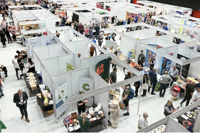 Main Auditorium at Connexin Live, Hull - bustling trade show with vendor booths and networking.