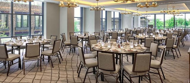 Elegant banquet hall with round tables, ideal for corporate events in Washington D.C.