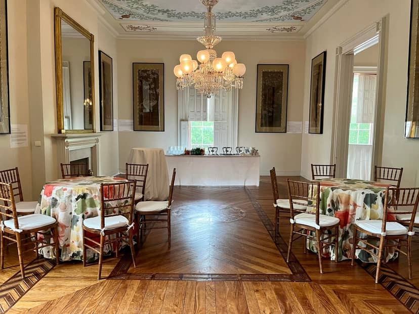 Belle Vue Room at Dumbarton House with elegant tables, ideal for networking events.