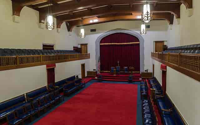 Elegant conference room with tiered seating at George Washington Masonic National Memorial.