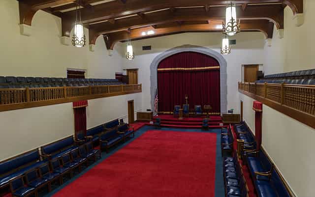 Elegant conference room with tiered seating at George Washington Masonic National Memorial.