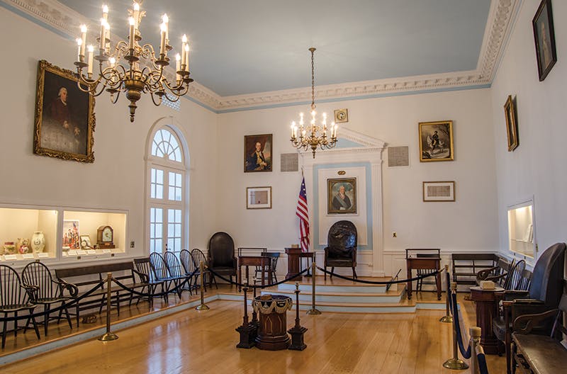 Elegant conference room with chandelier at George Washington Masonic Memorial for events.