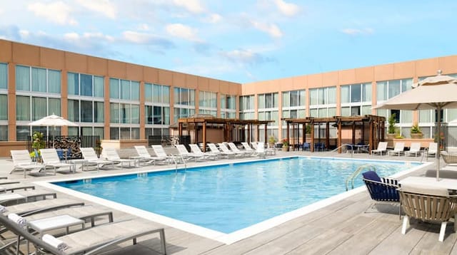 L'Enfant Bar and Grill pool area, ideal for summer receptions and outdoor networking events.