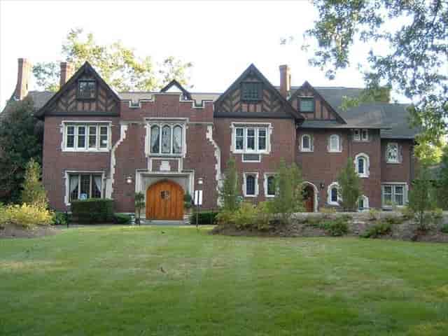 Historic Whittemore House garden, elegant brick facade, perfect for upscale events.