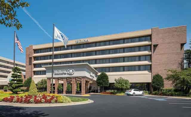 Washington Hilton conference center entrance with modern architecture, ideal for corporate events.