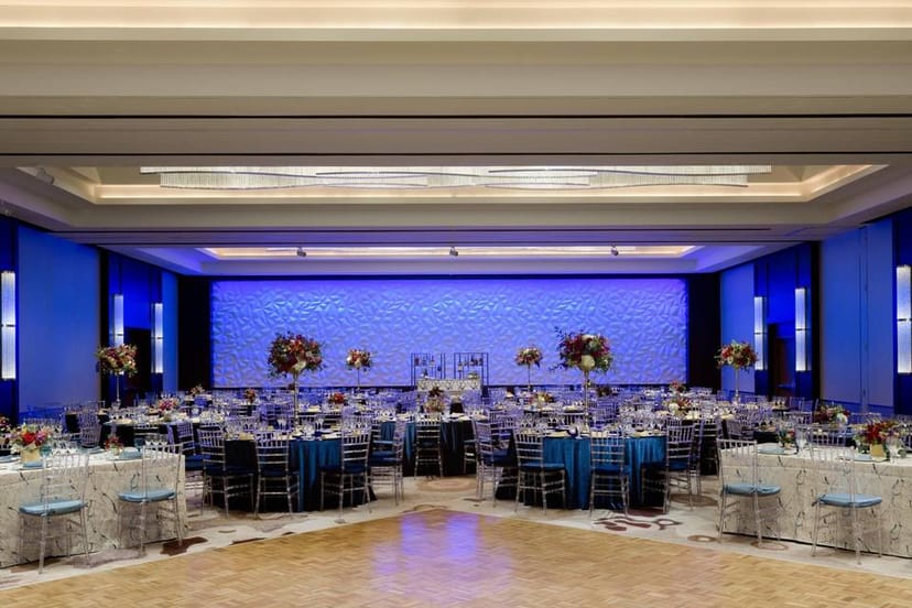 Elegant ballroom at Washington Hilton with blue tablecloths, perfect for weddings and galas.