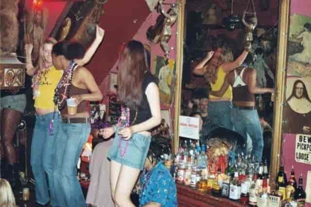 Bar at Madam's Organ featuring vibrant decor, live music venue, Washington DC nightlife.