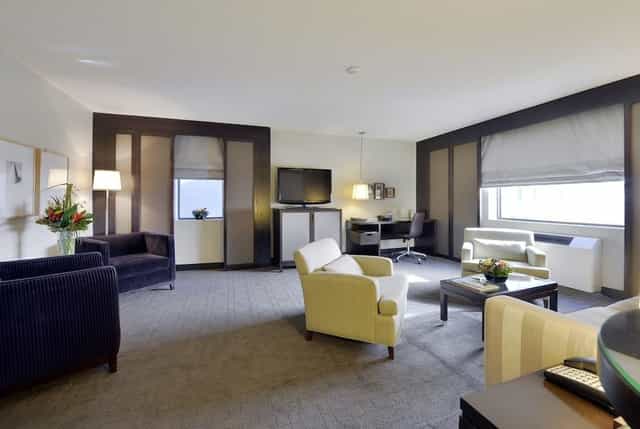 Modern meeting space in Suites at Arc The.Hotel Ottawa, ideal for small events and brainstorming.