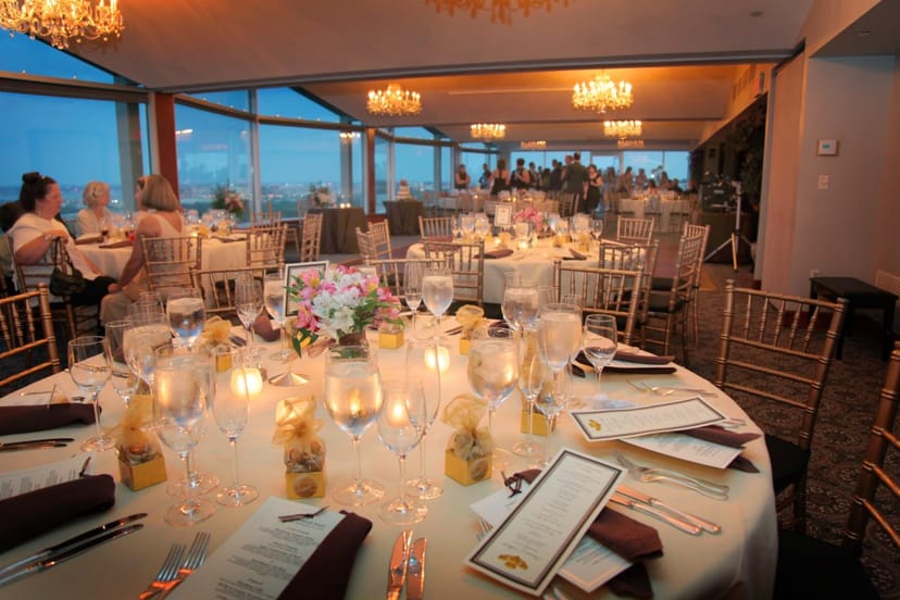 Elegant dining room in Top of the Town conference facility for high-end events.
