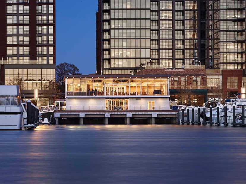 "Capital Yacht Club waterfront venue with modern architecture for upscale events"