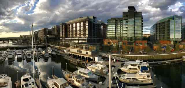 Yacht club waterfront venue with modern architecture for events and gatherings.