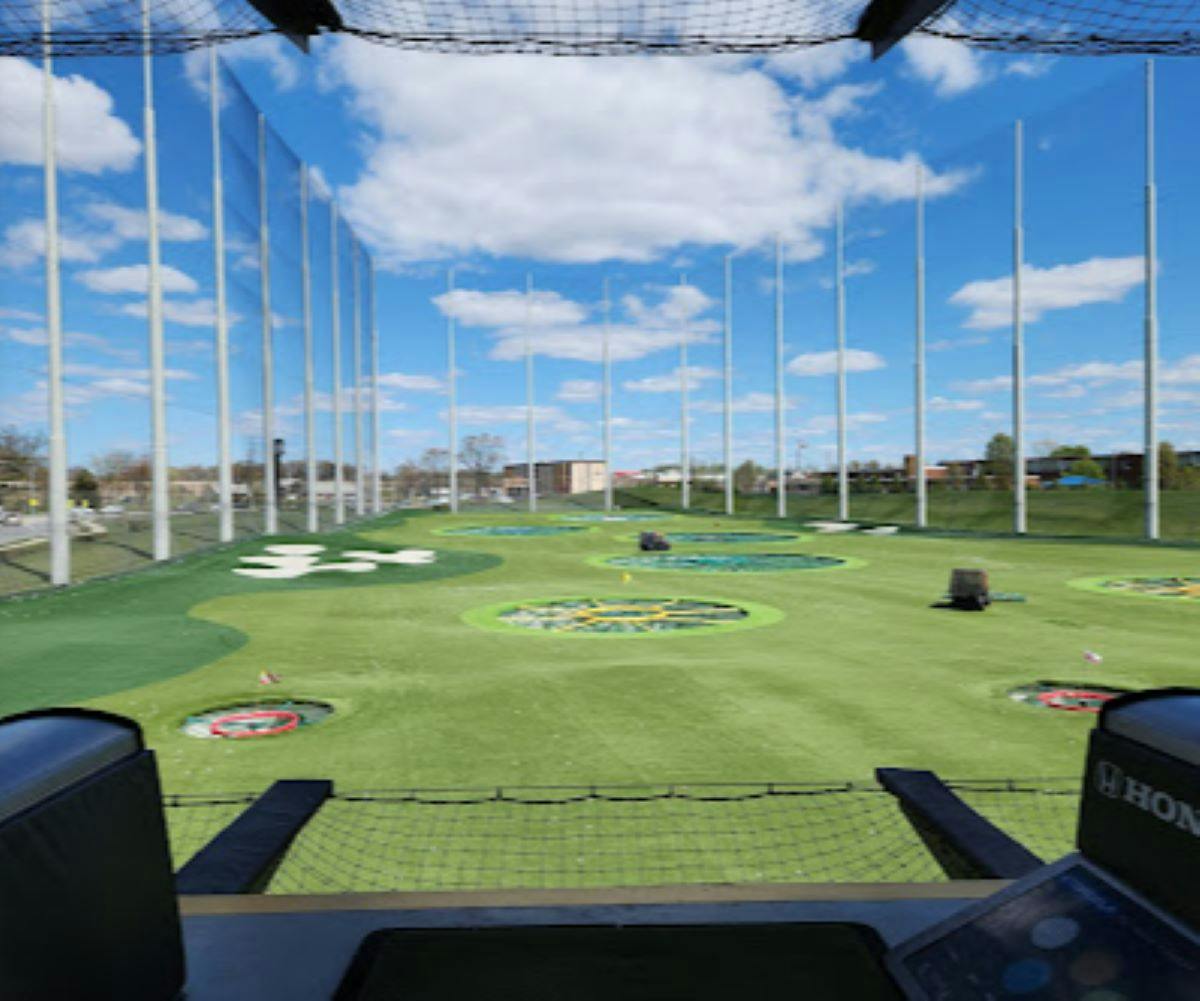 Azure at Topgolf D.C. driving range, vibrant turf for corporate events and team-building.