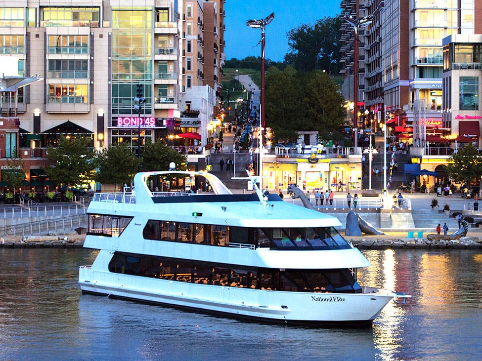 Sleek event yacht docked in vibrant Washington DC, perfect for upscale gatherings and celebrations.