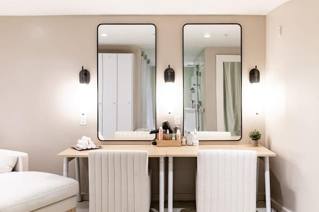 Liberty A/B prep area in Archer Hotel Alexandria with dual mirrors for events.