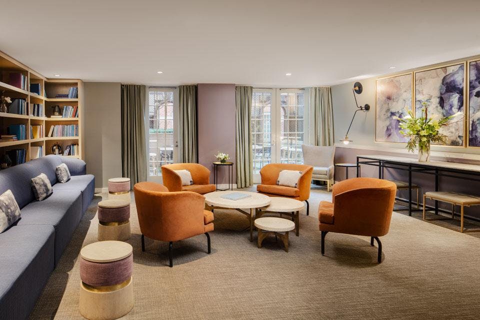 Stylish Brabo Back Room at Archer Hotel Alexandria, ideal for networking events and meetings.