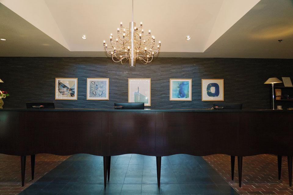 Brabo Back Room reception with elegant chandelier, perfect for events in Alexandria.