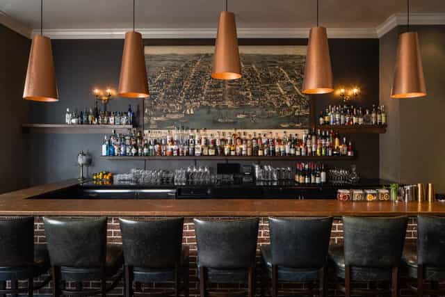 Liberty Ballroom bar at Archer Hotel Alexandria, ideal for networking events and cocktail receptions.