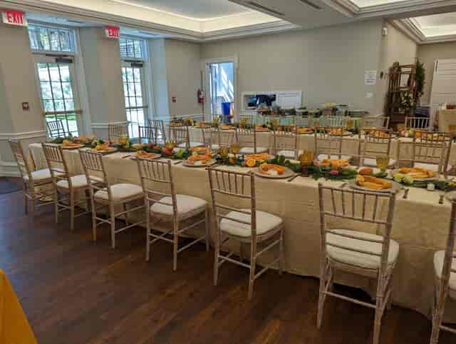 Elegant banquet setup with vibrant centerpieces for networking events.