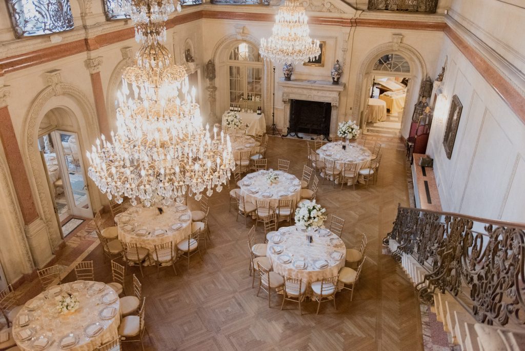 Elegant Grand Ballroom Pre-Function with floral centerpieces, ideal for weddings and corporate events.