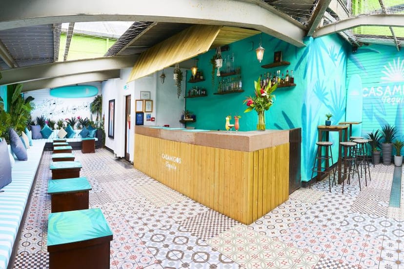 Casamigos Terrace: vibrant event space with colorful decor for casual gatherings and networking.