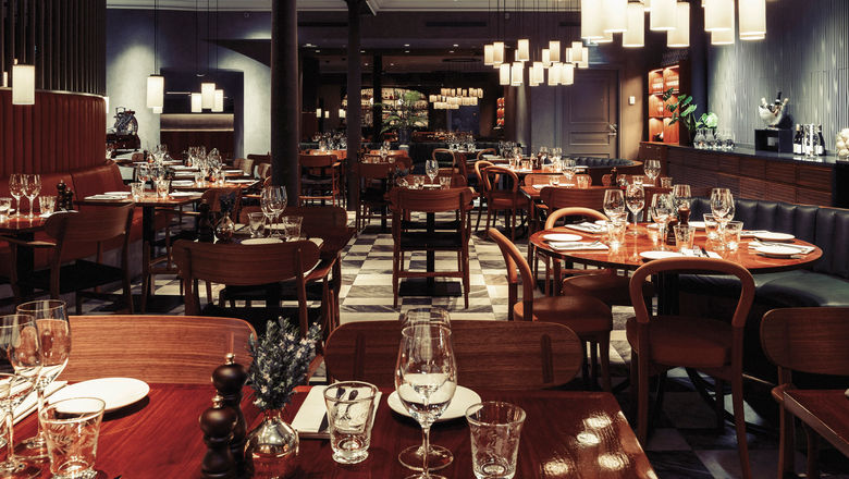 Sophisticated Nobis Hotel restaurant with elegant decor for corporate dinners and events.