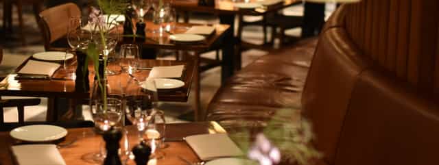 Elegant dining space at Nobis Hotel, perfect for upscale events and intimate gatherings.