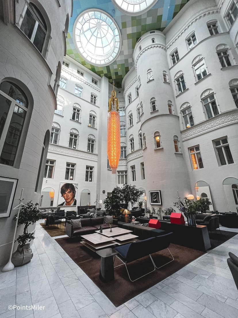 Modern lounge atrium at Nobis Hotel, perfect for networking events and meetings.