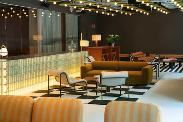 Stylish lounge area with comfortable seating for networking events and meetings.