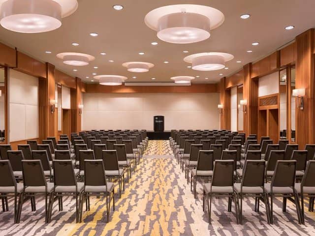 Drottningholmsalen B conference room with organized seating for professional events.