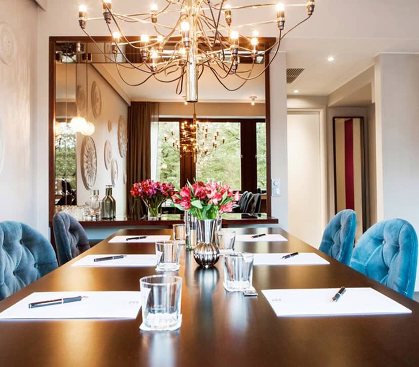 Modern meeting room at Elite Hotel Adlon, ideal for corporate events and gatherings.