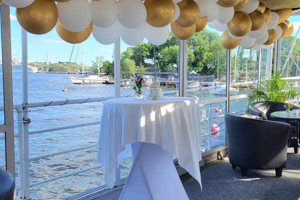 Elegant event space at Hotel Skeppsholmen with gold balloon decor, ideal for receptions.