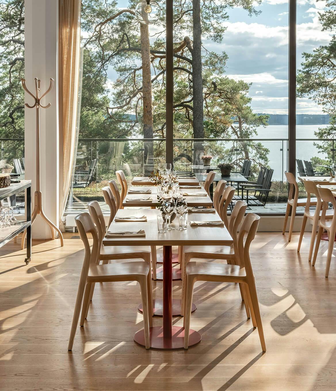 Artipelag Restaurant dining space with elegant table settings for events and gatherings.