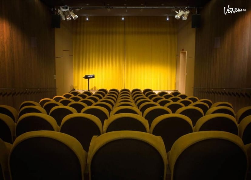 Biografen auditorium at Moderna Museet with yellow seating for presentations and conferences.