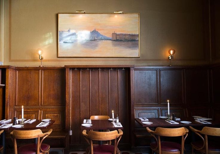 Elegant dining space with warm wood accents, perfect for intimate gatherings and corporate events.