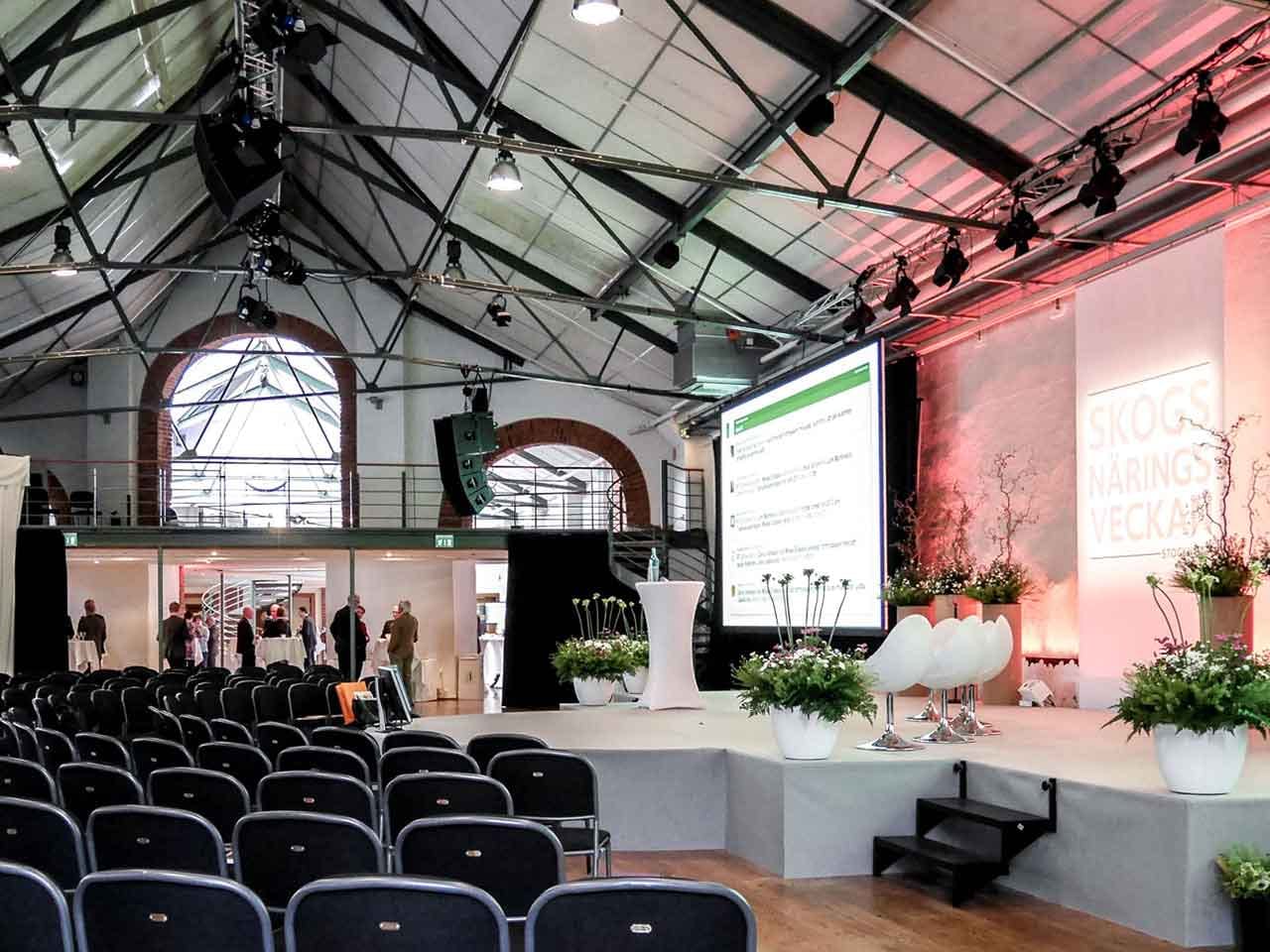 Event venue in Münchenbryggeriet with stage, ideal for presentations and meetings.