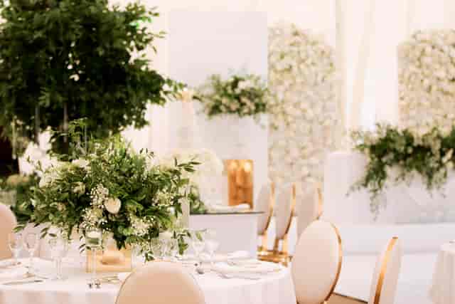 Elegant Pavilion at Quendon Hall with floral decor, perfect for weddings and upscale events.