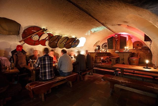 Cozy bar at Sjätte Tunnan Medieval Restaurant, ideal for themed events and gatherings.