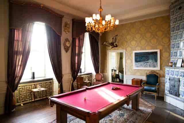 Upper Gothic Parlor with pink billiard table, ideal for networking and brainstorming events.