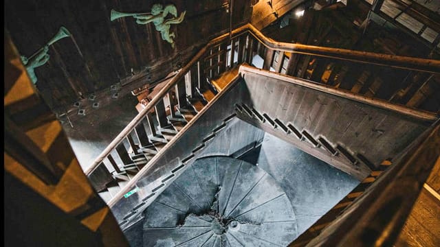 Spiral staircase at Stockholm City Hall, perfect for events and photo backdrops.