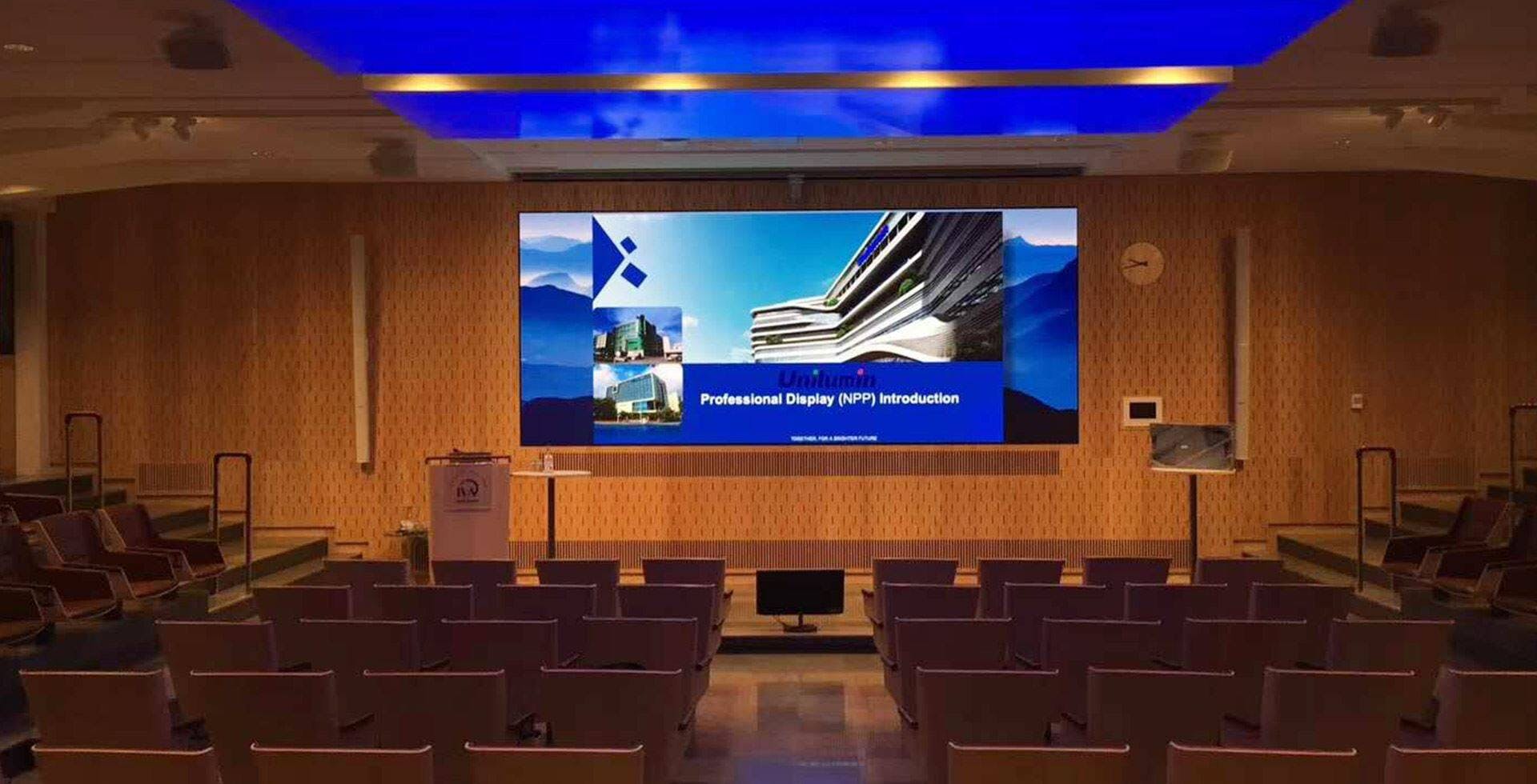 Wallenberg Auditorium: modern conference room with large display for impactful presentations.